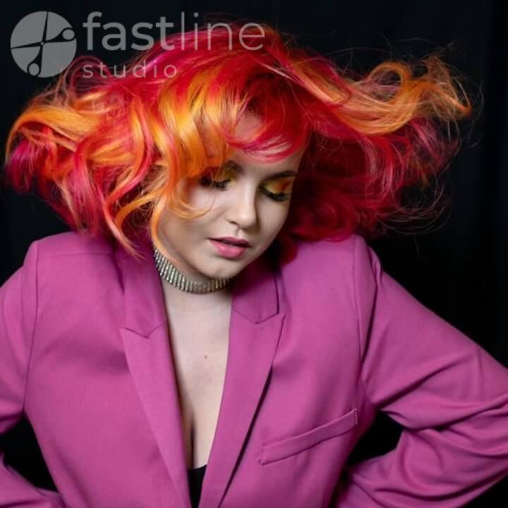 Photo of creative colorful hair dye on medium-length hair with vibrant shades